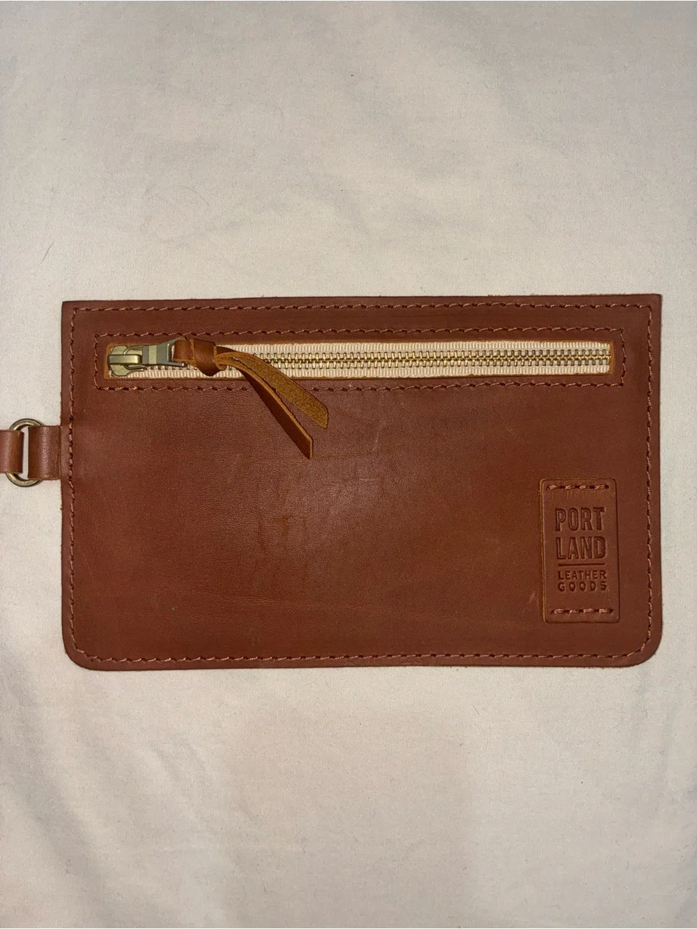 Portland Leather Goods brown leather wristlet zipper pouch with removable strap